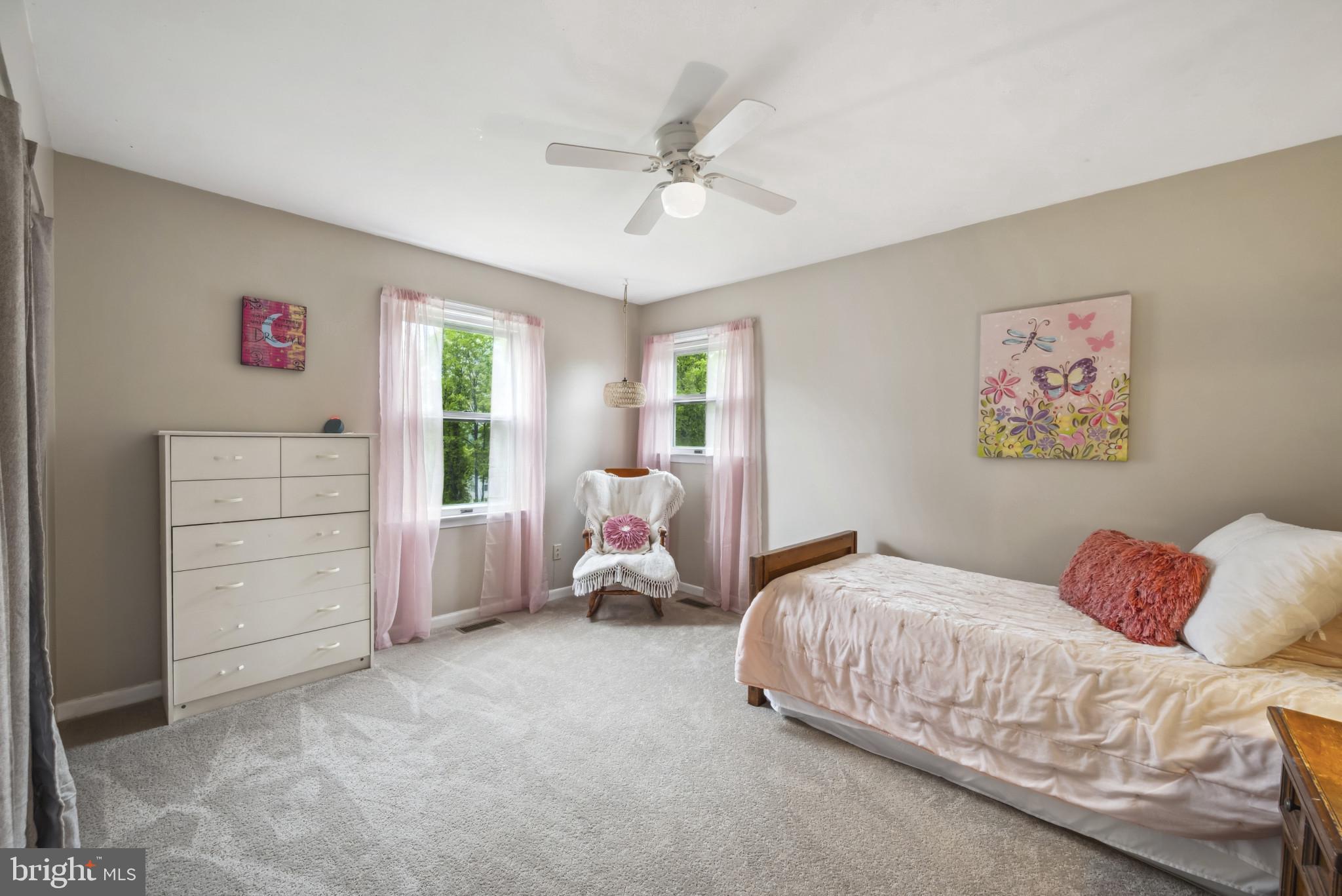 3825 Salem Bottom Road Westminster, MD 21157 - Photo 17 of 43 a bedroom with a bed and a chandelier