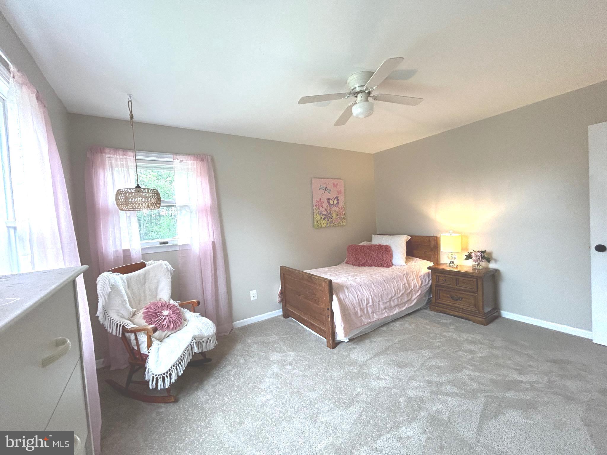 3825 Salem Bottom Road Westminster, MD 21157 - Photo 18 of 43 a spacious bedroom with a bed and window