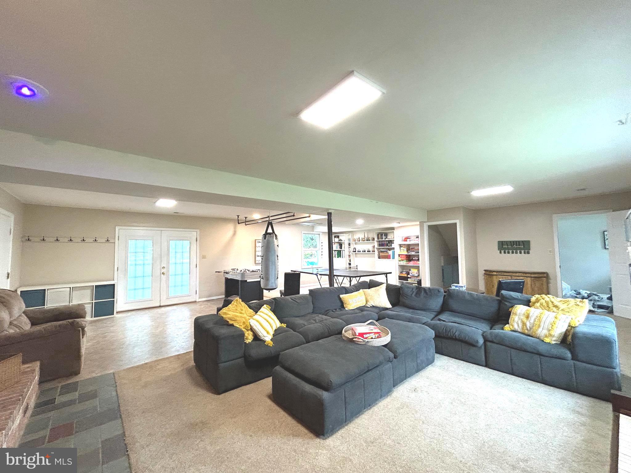3825 Salem Bottom Road Westminster, MD 21157 - Photo 23 of 43 a living room with furniture and a large window