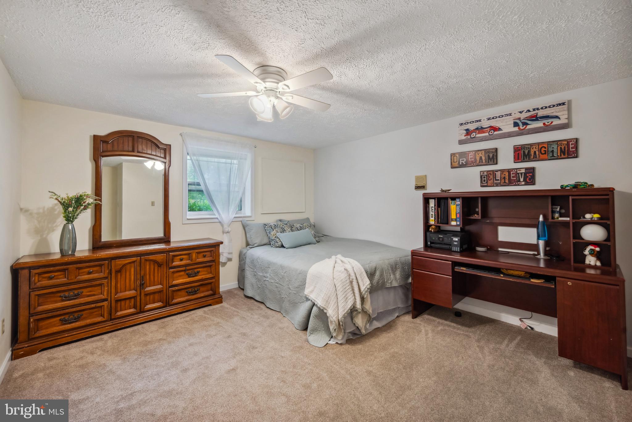 3825 Salem Bottom Road Westminster, MD 21157 - Photo 25 of 43 a bedroom with a bed and dresser