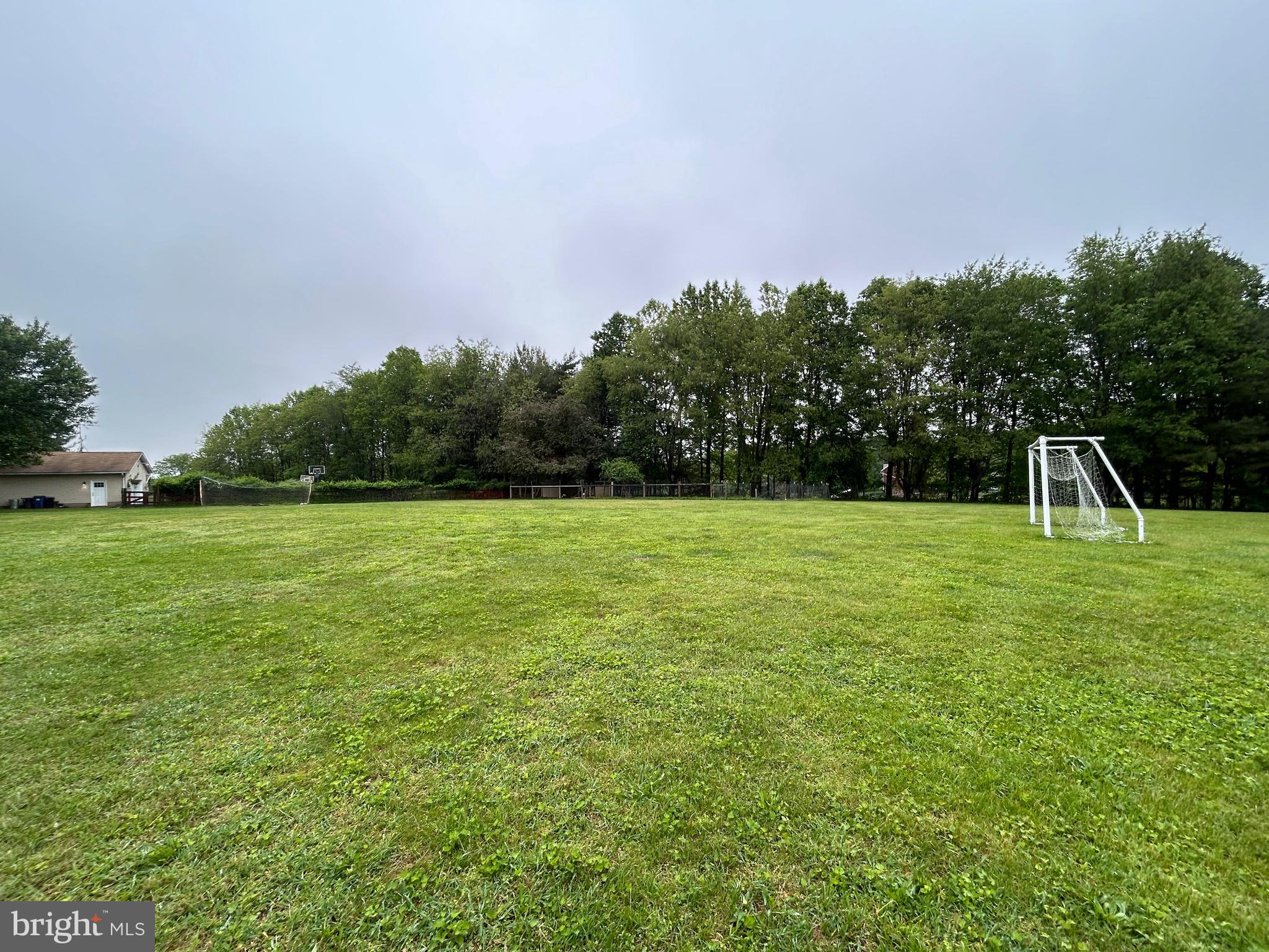 3825 Salem Bottom Road Westminster, MD 21157 - Photo 36 of 43 a view of a garden and basketball court