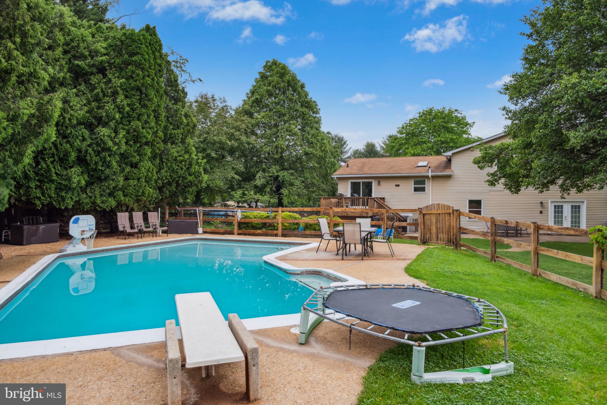 3825 Salem Bottom Road Westminster, MD 21157 - Photo 42 of 43 a view of a house with swimming pool and sitting area