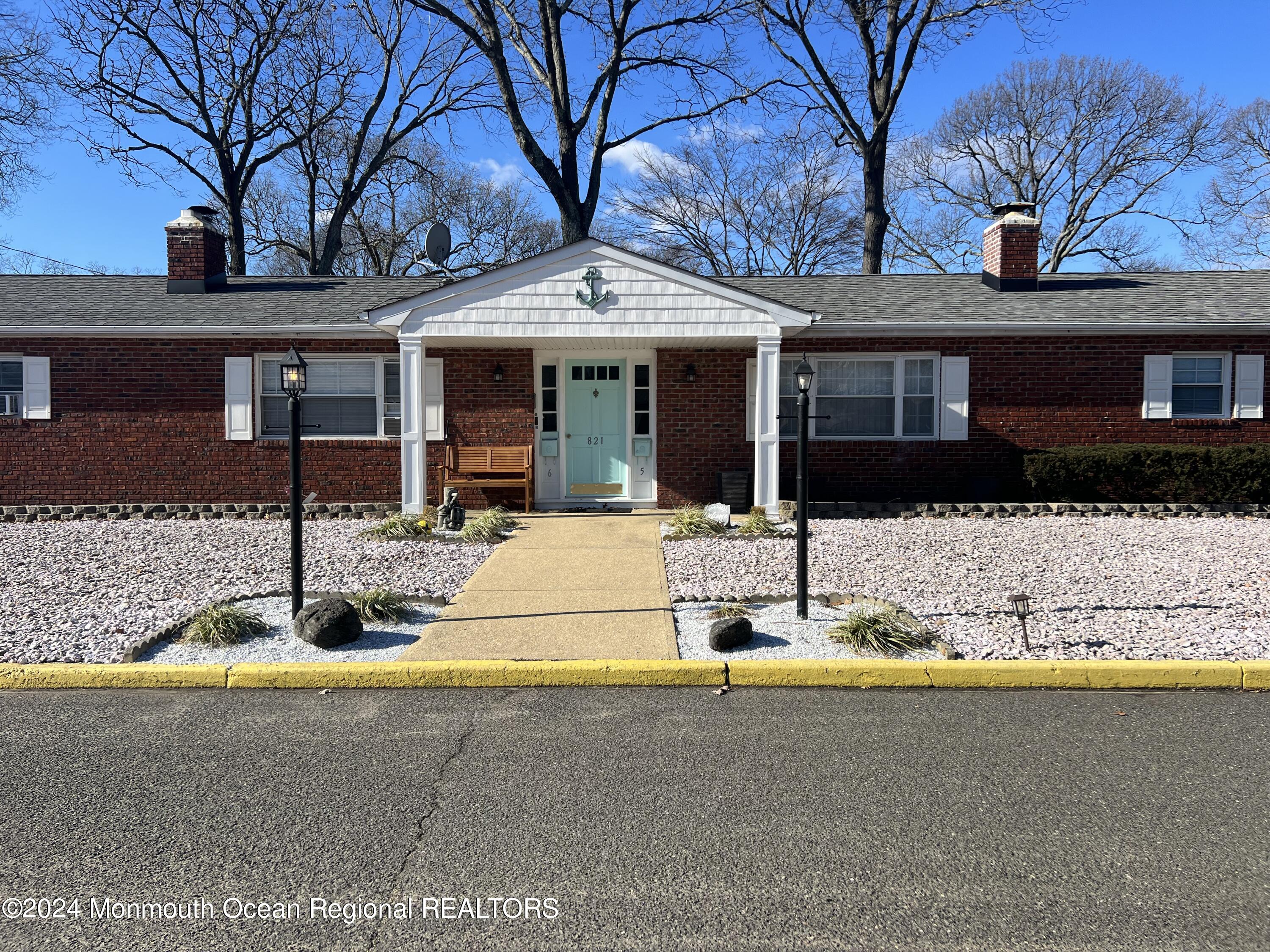 821 Burnt Tavern Road, Unit 6 Point Pleasant, NJ 08742 - Photo 1 of 7 a front view of a house