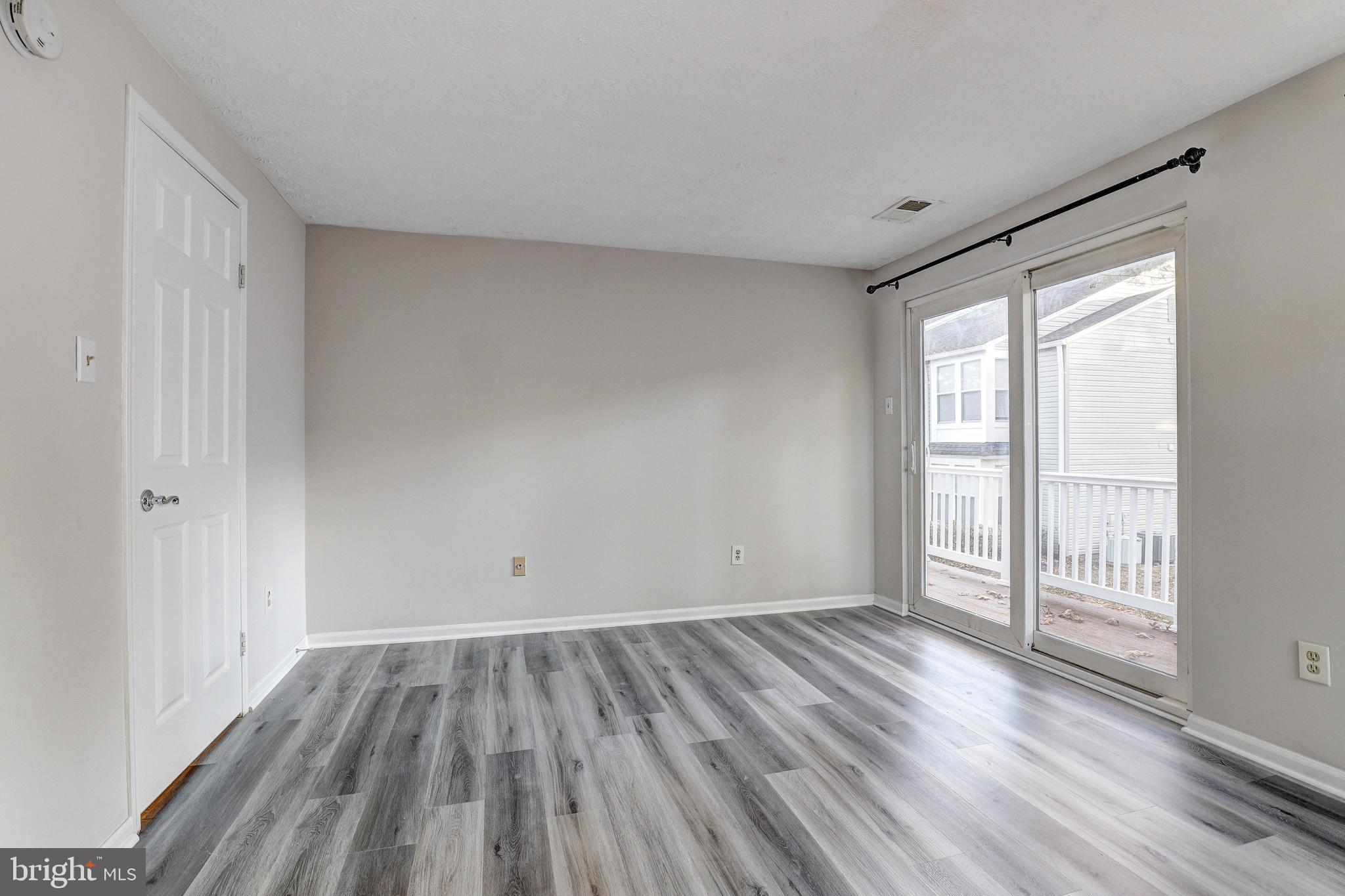 5920 Watch Chain Way, Unit 5106 Columbia, MD 21044 - Photo 16 of 27 a view of wooden floor in an empty room