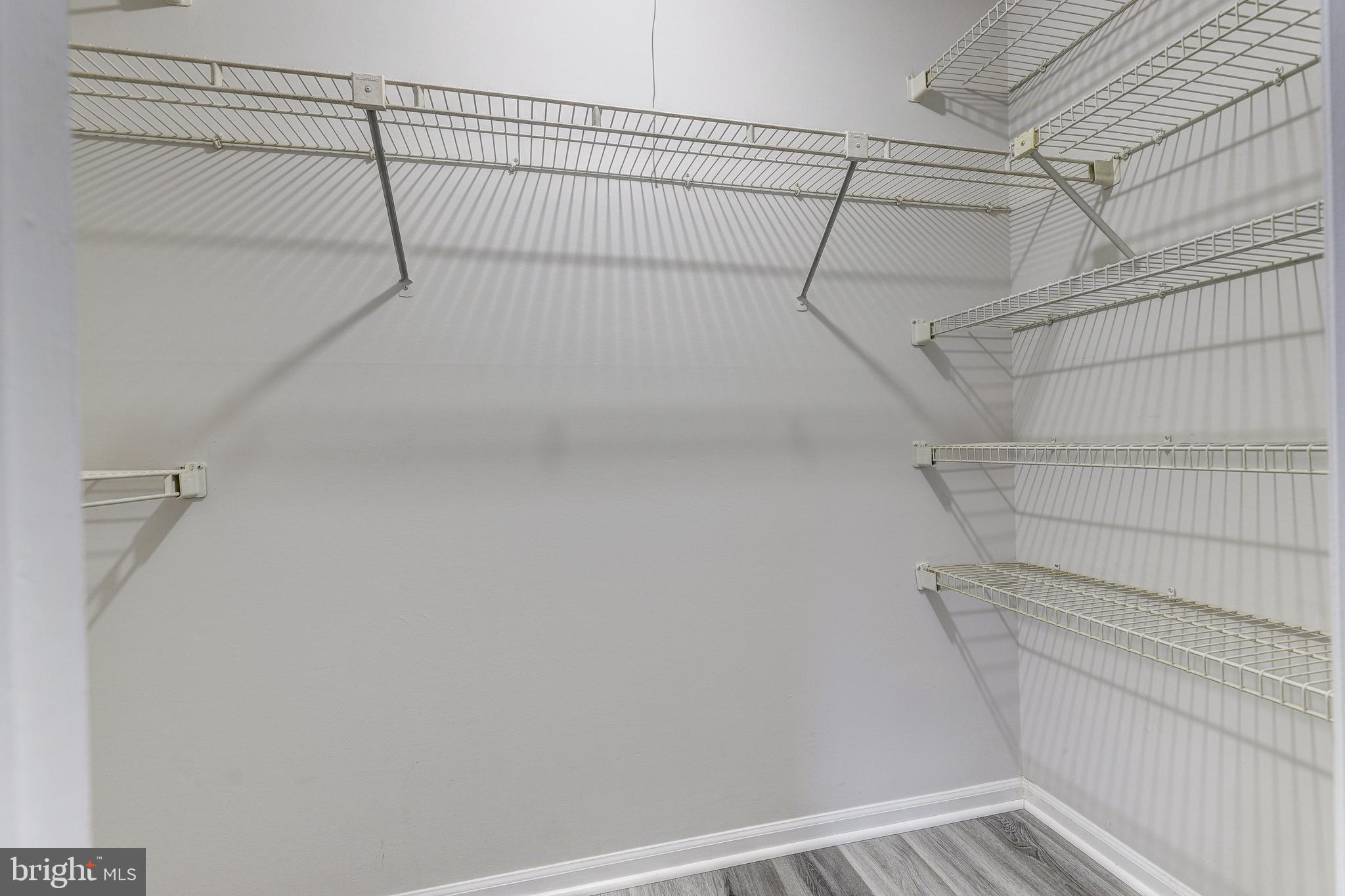 5920 Watch Chain Way, Unit 5106 Columbia, MD 21044 - Photo 17 of 27 a view of a room with racks on the wall