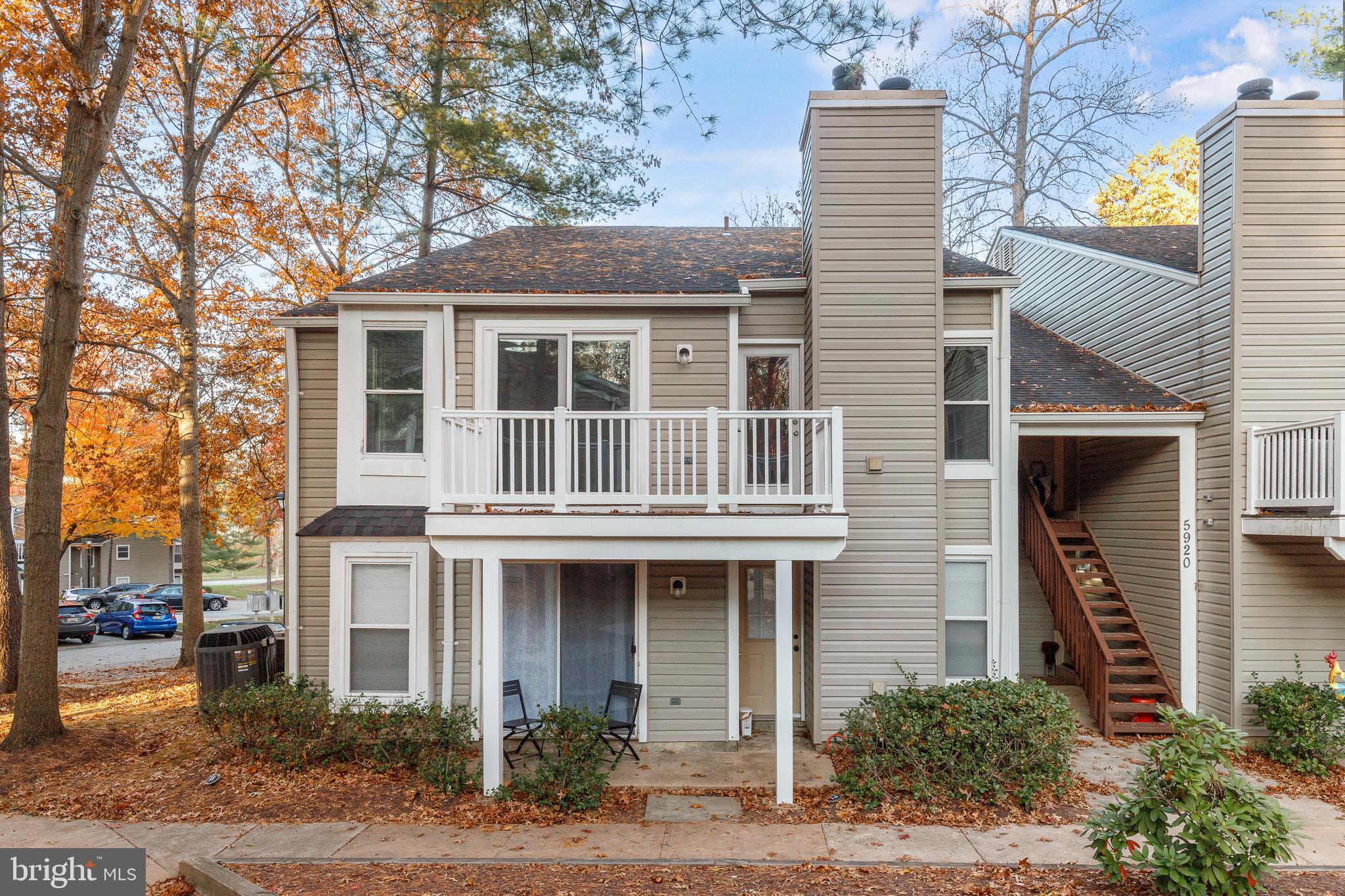 5920 Watch Chain Way, Unit 5106 Columbia, MD 21044 - Photo 21 of 27 a front view of a house with garden