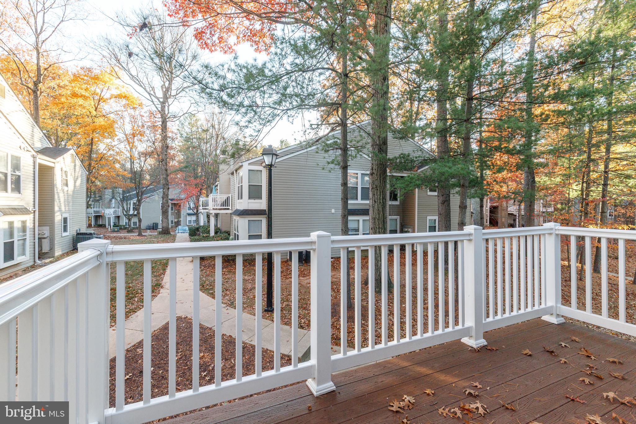 5920 Watch Chain Way, Unit 5106 Columbia, MD 21044 - Photo 25 of 27 a view of a large building with a large window