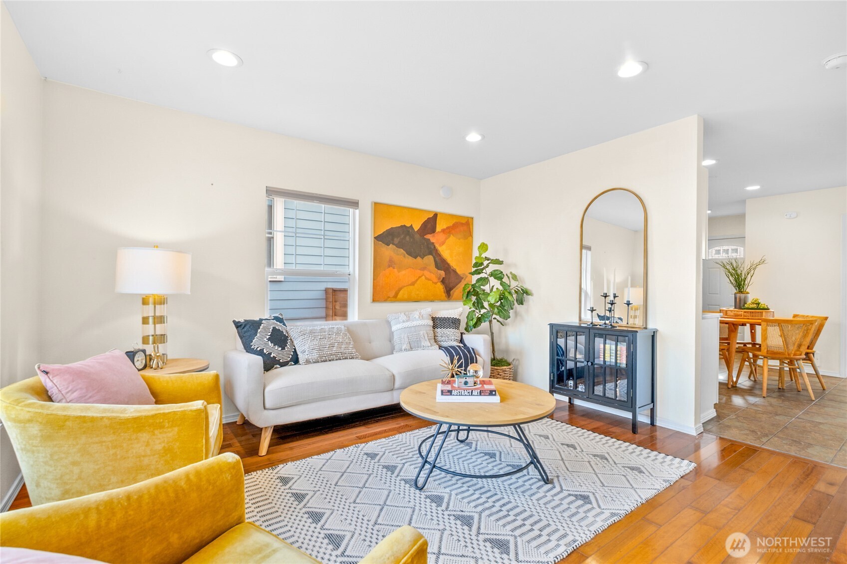 245 Wells Avenue North Renton, WA 98057 - Photo 7 of 26 a living room with furniture and a table