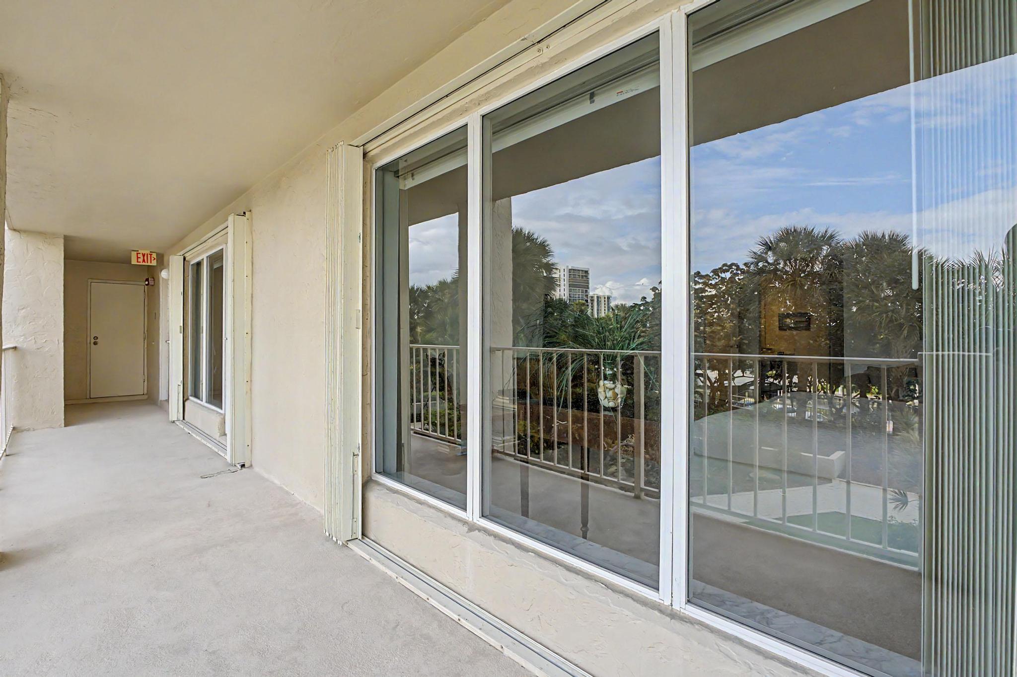 4301 North Ocean Boulevard, Unit A206 Boca Raton, FL 33431 - Photo 37 of 65 a view of a glass door of the house