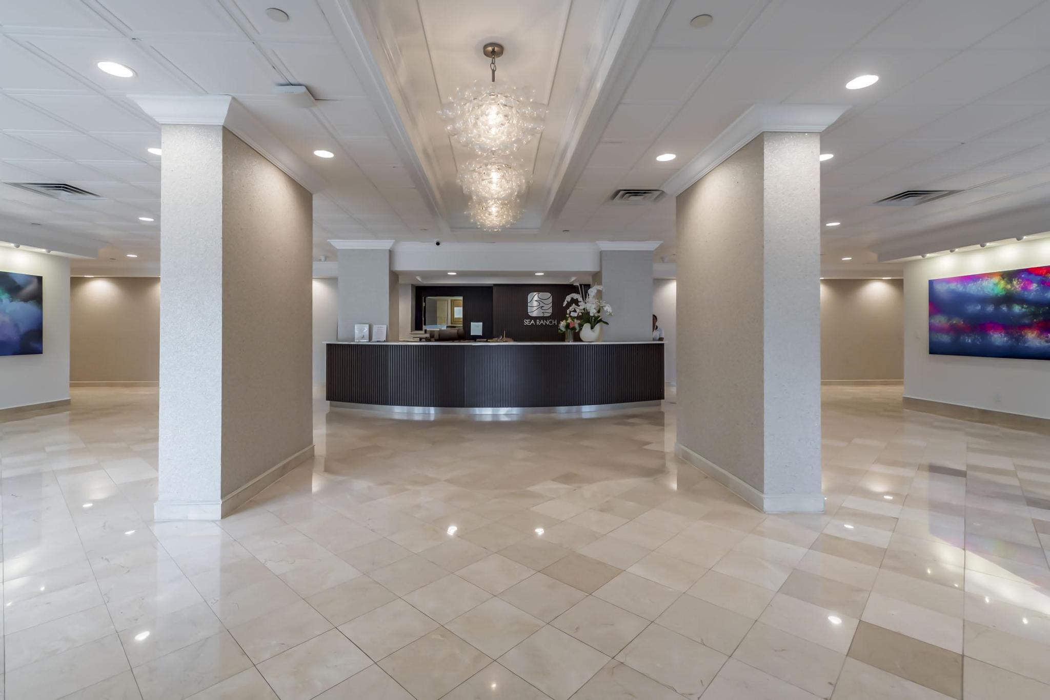 4301 North Ocean Boulevard, Unit A206 Boca Raton, FL 33431 - Photo 48 of 65 an empty room with kitchen and stainless steel appliances