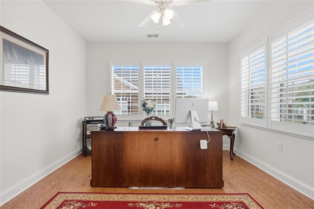3328 Ivy Ridge Court Buford, GA 30519 - Photo 11 of 34 a living room with furniture and window