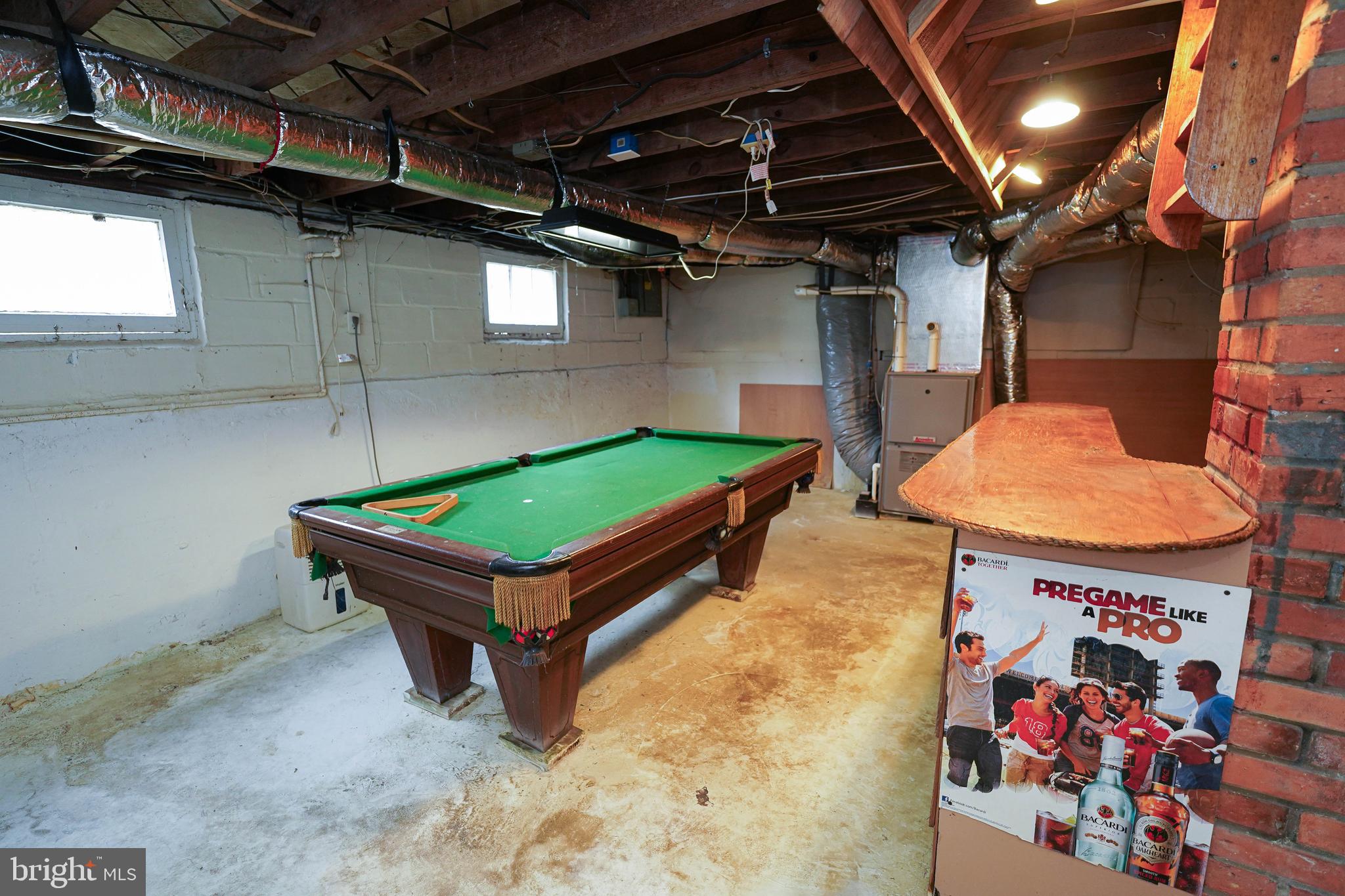31339 Old Ocean City Road Salisbury, MD 21804 - Photo 25 of 52 a room with musical instruments and wooden walls