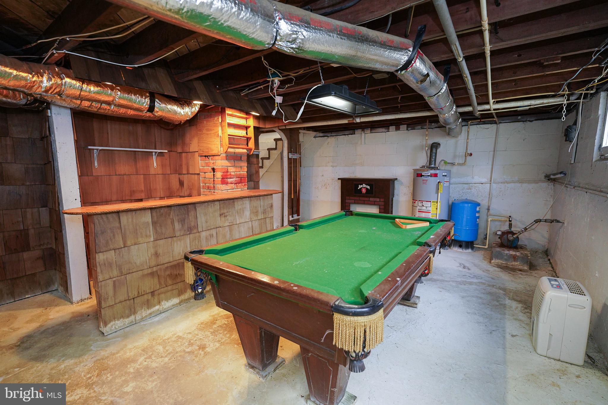 31339 Old Ocean City Road Salisbury, MD 21804 - Photo 27 of 52 a room with pool table and a fireplace