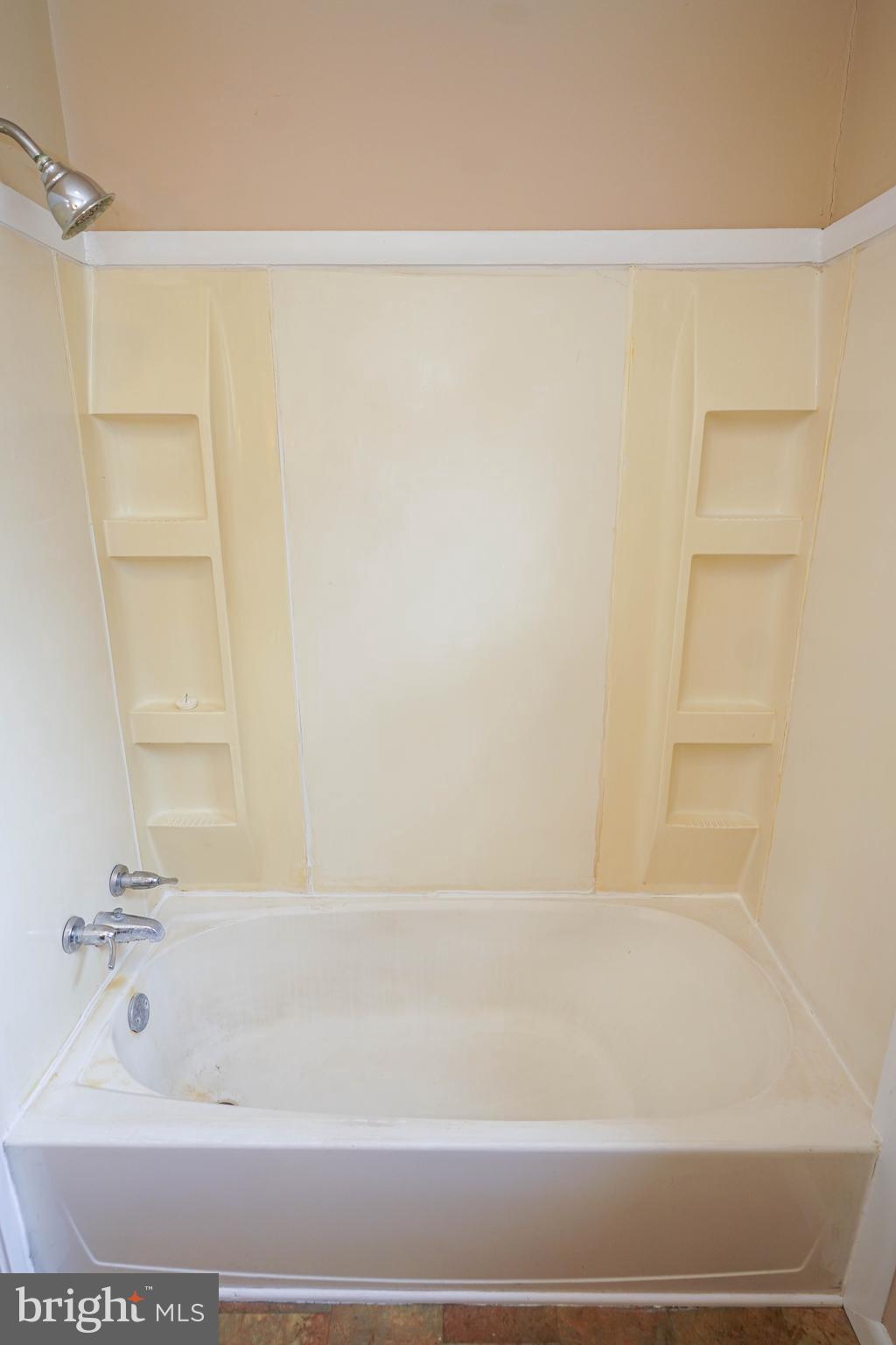 31339 Old Ocean City Road Salisbury, MD 21804 - Photo 35 of 52 a bathroom with a shower and a bathtub