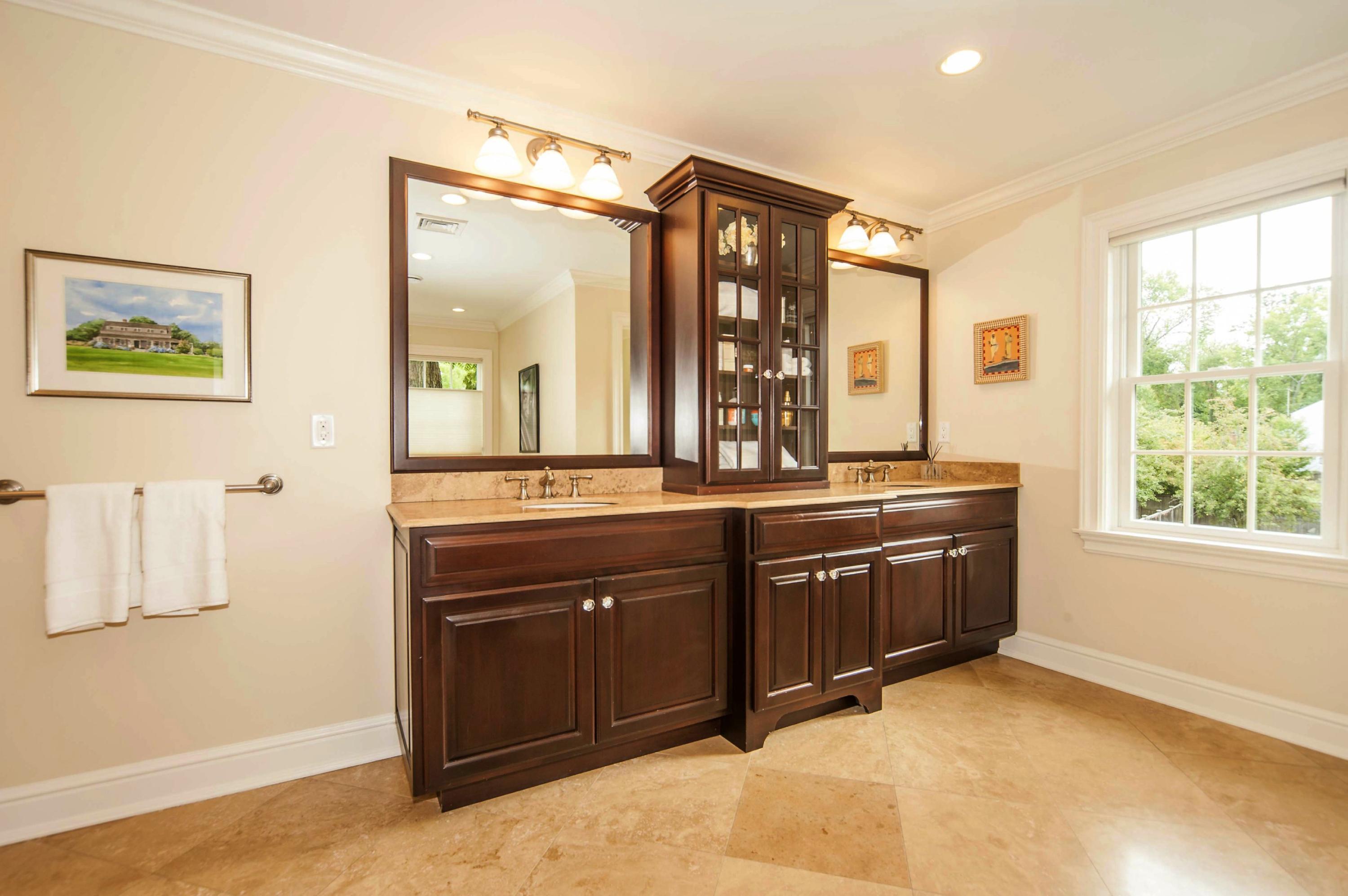 2 Hampton Road Darien, CT 06820 - Photo 14 of 25 a spacious bathroom with a granite countertop sink and a large mirror