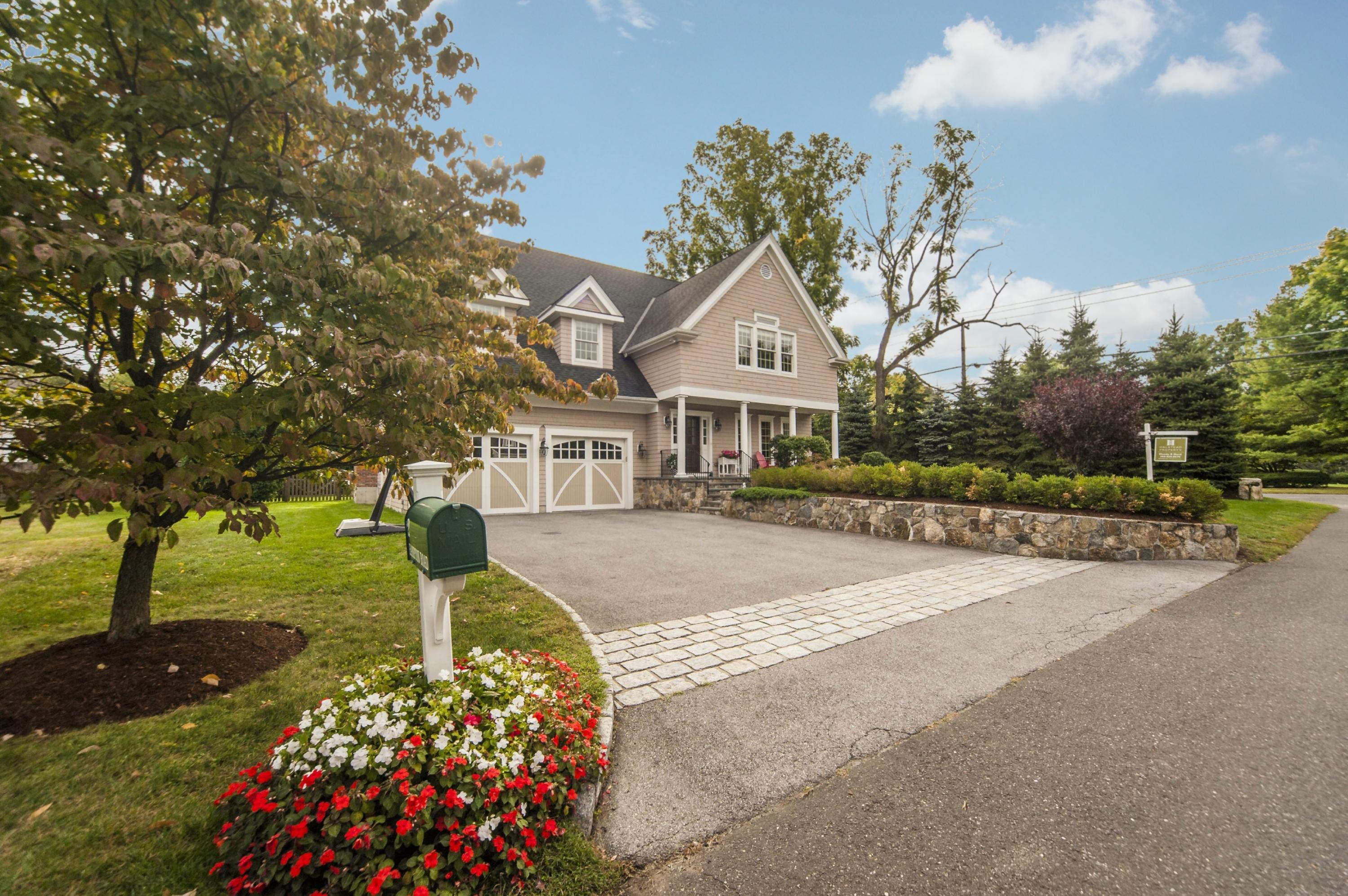 2 Hampton Road Darien, CT 06820 - Photo 2 of 25 a front view of a house with a yard and trees