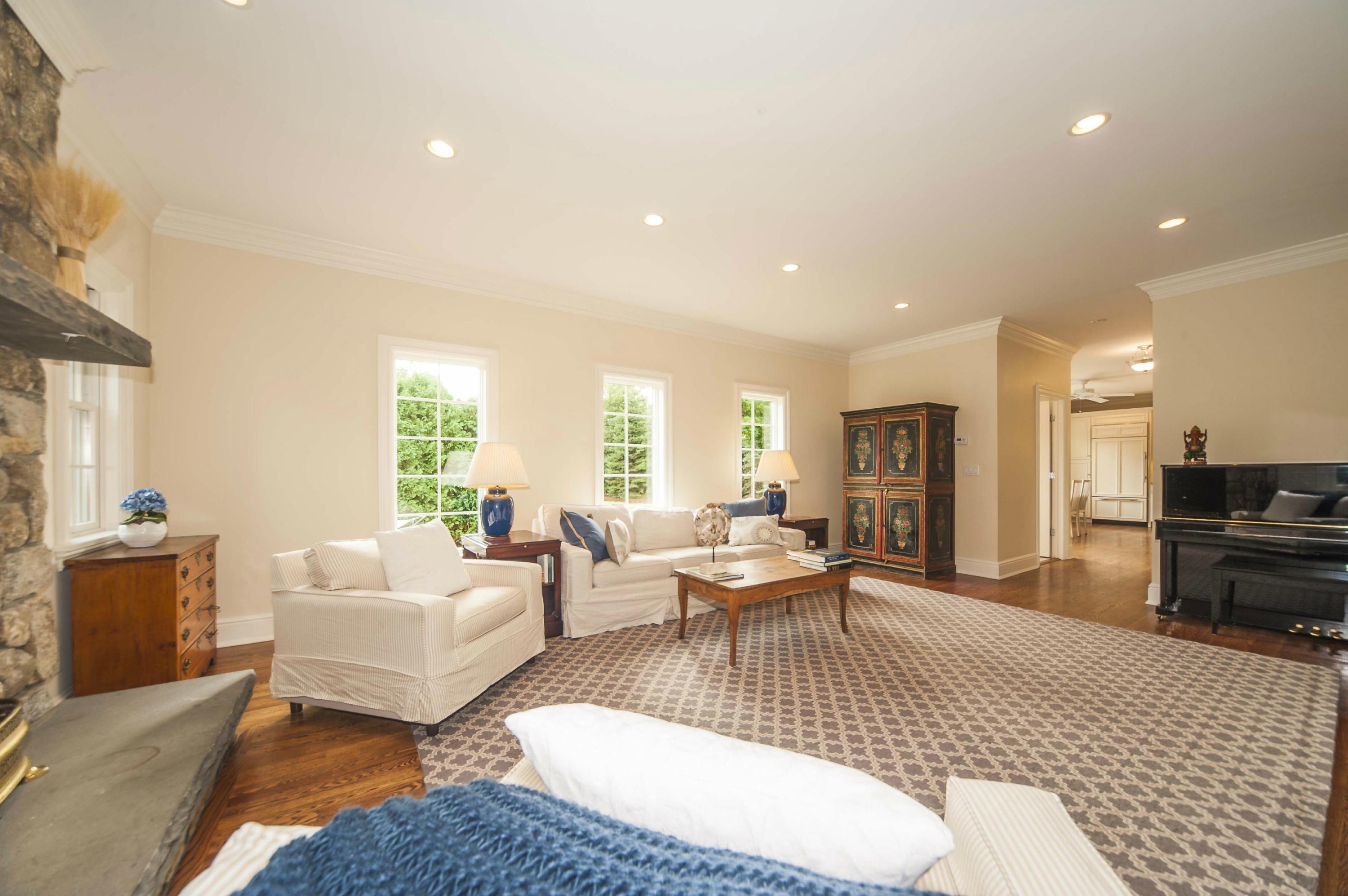 2 Hampton Road Darien, CT 06820 - Photo 21 of 25 a living room with furniture wooden floor and a table