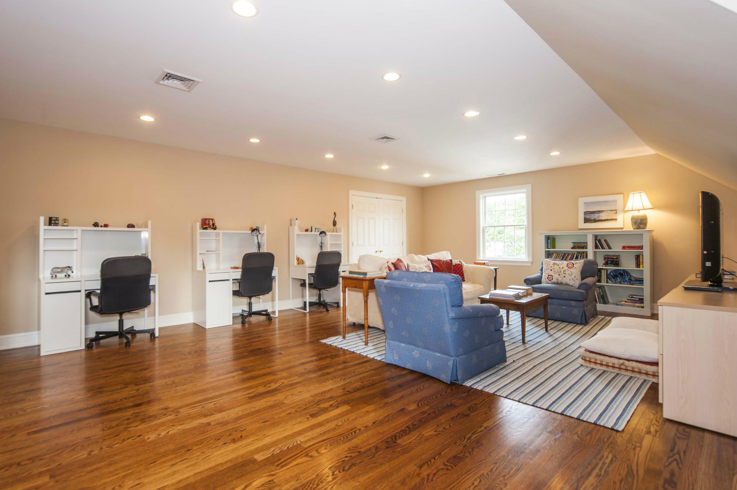 2 Hampton Road Darien, CT 06820 - Photo 22 of 25 a living room with lots of furniture hard wood floor and furniture