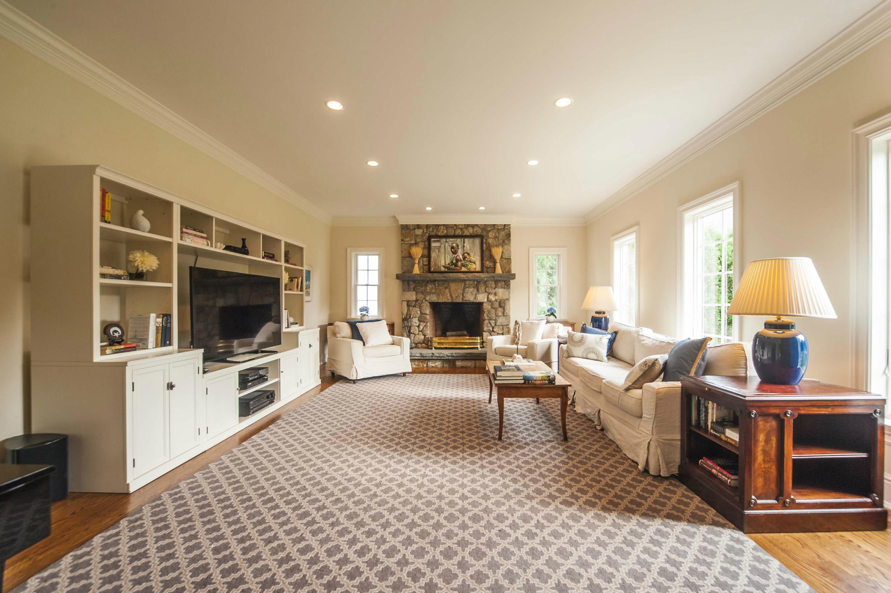 2 Hampton Road Darien, CT 06820 - Photo 10 of 25 a living room with furniture and a flat screen tv