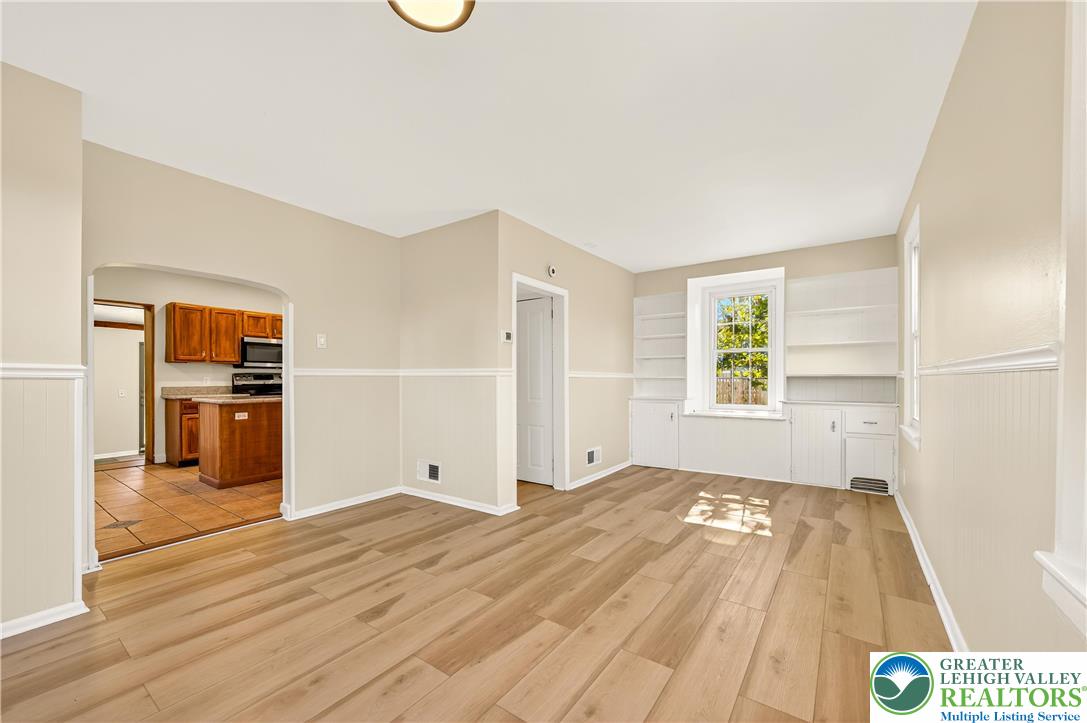 1740 Butztown Road Bethlehem, PA 18017 - Photo 9 of 29 a view of a kitchen with wooden floor and a refrigerator