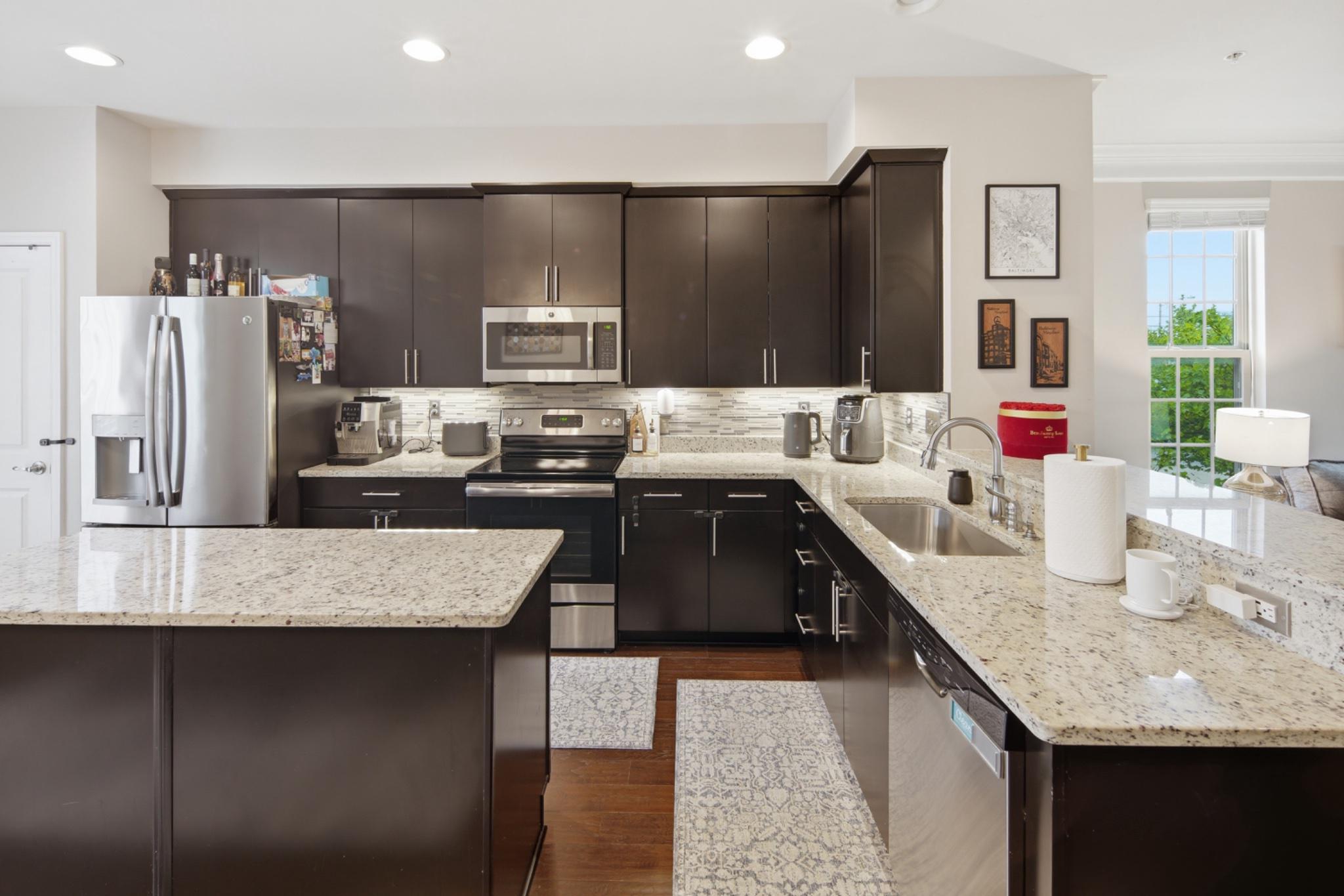120 Oldham Street Baltimore, MD 21224 - Photo 11 of 35 Large Island and gleaming granite