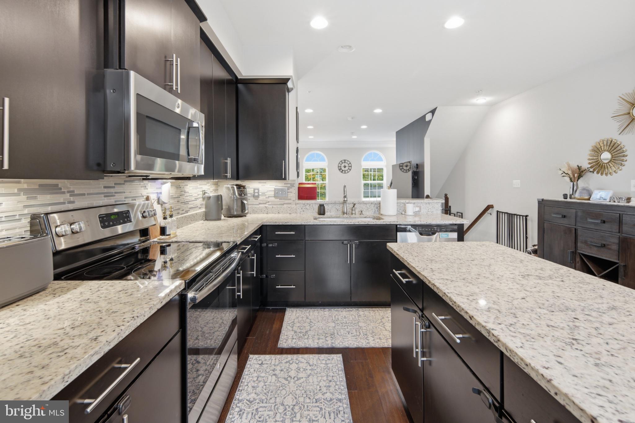 120 Oldham Street Baltimore, MD 21224 - Photo 14 of 35 Modern kitchen with sleek finishes.