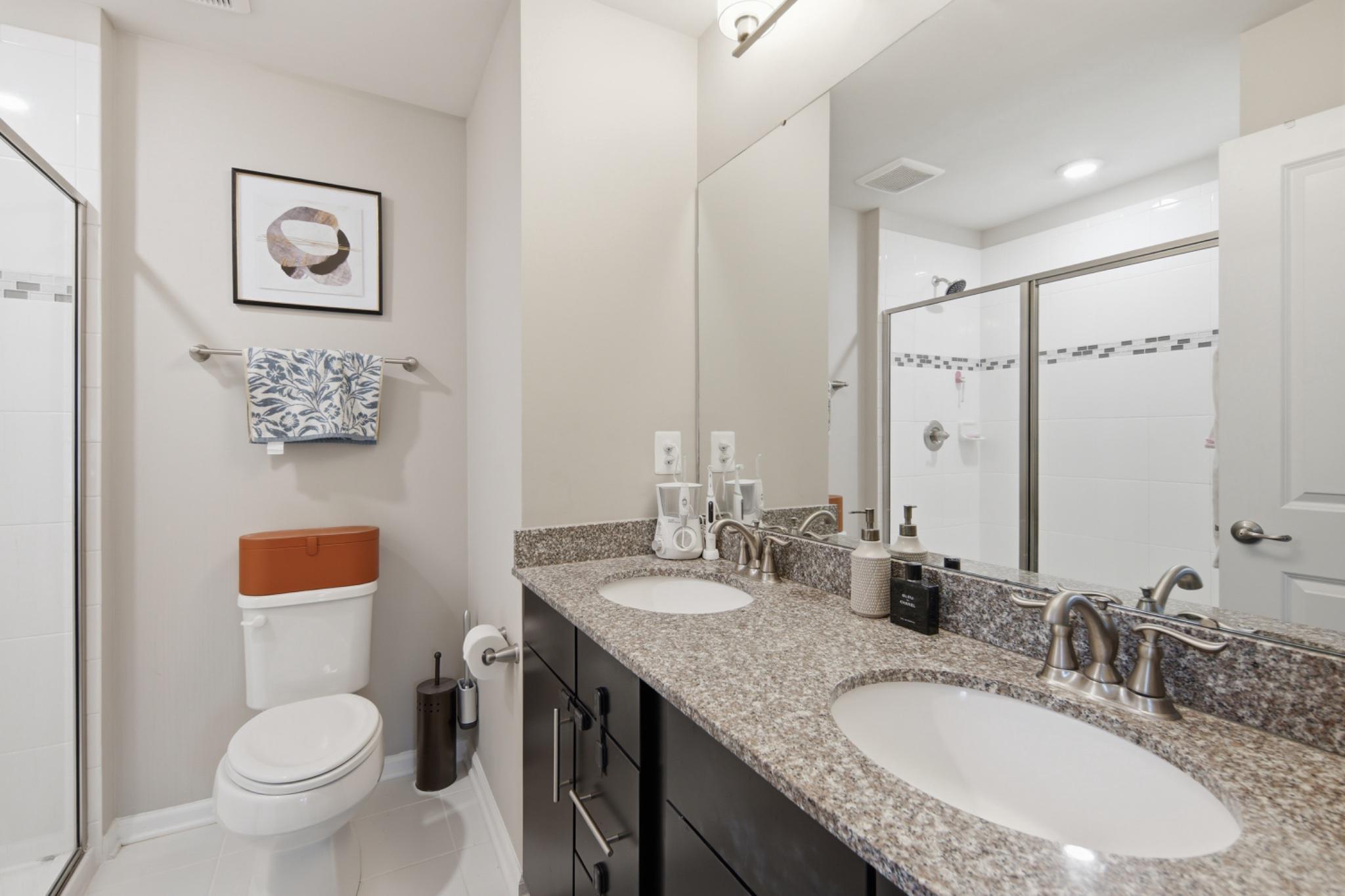 120 Oldham Street Baltimore, MD 21224 - Photo 20 of 35 Modern bathroom double vanity and dual shower