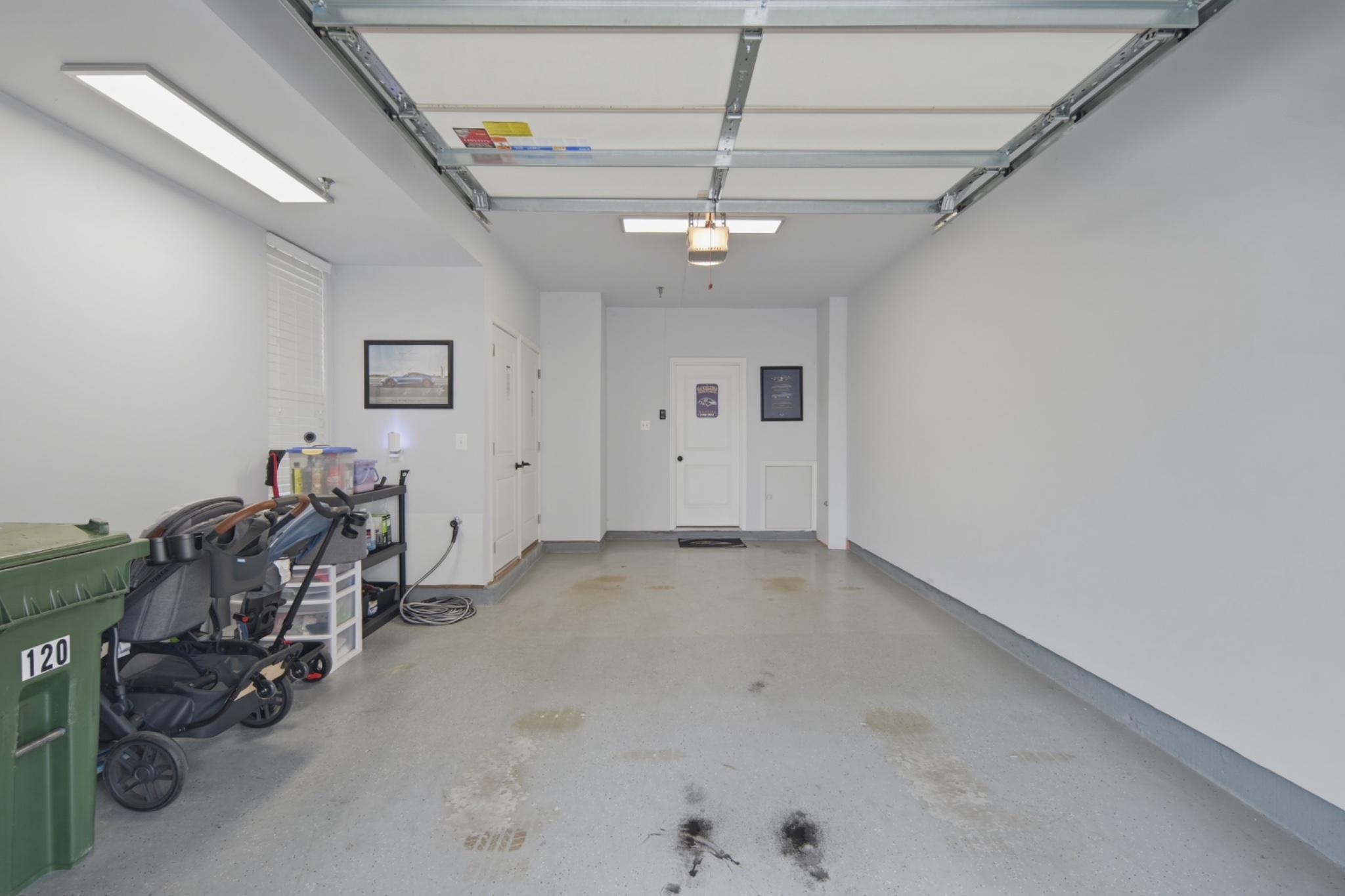 120 Oldham Street Baltimore, MD 21224 - Photo 29 of 35 Spacious, finished garage w/ storage and lighting