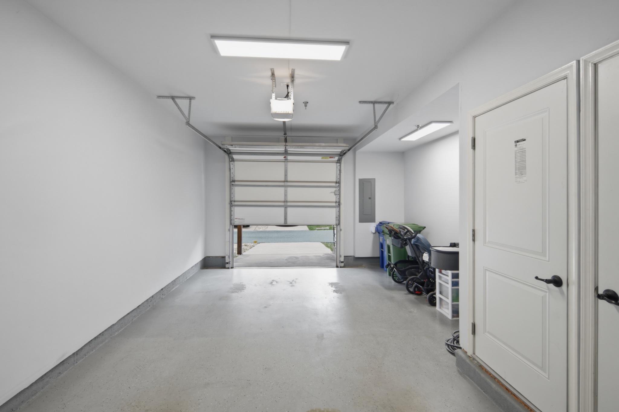 120 Oldham Street Baltimore, MD 21224 - Photo 30 of 35 Spacious, finished garage w/ storage and lighting