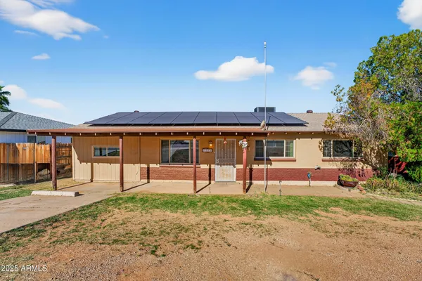 a front view of a house with a porch