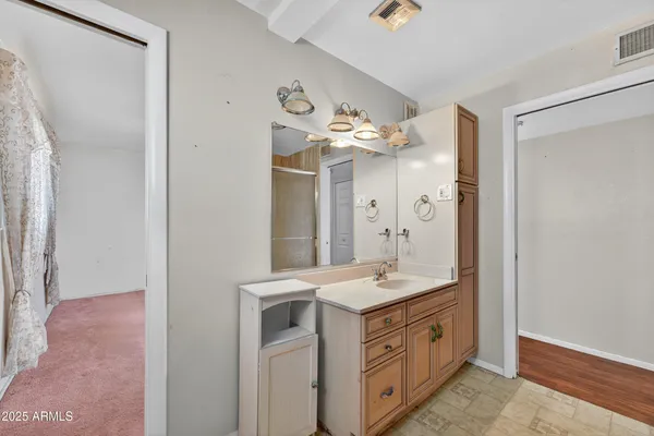 a view of empty room with windows