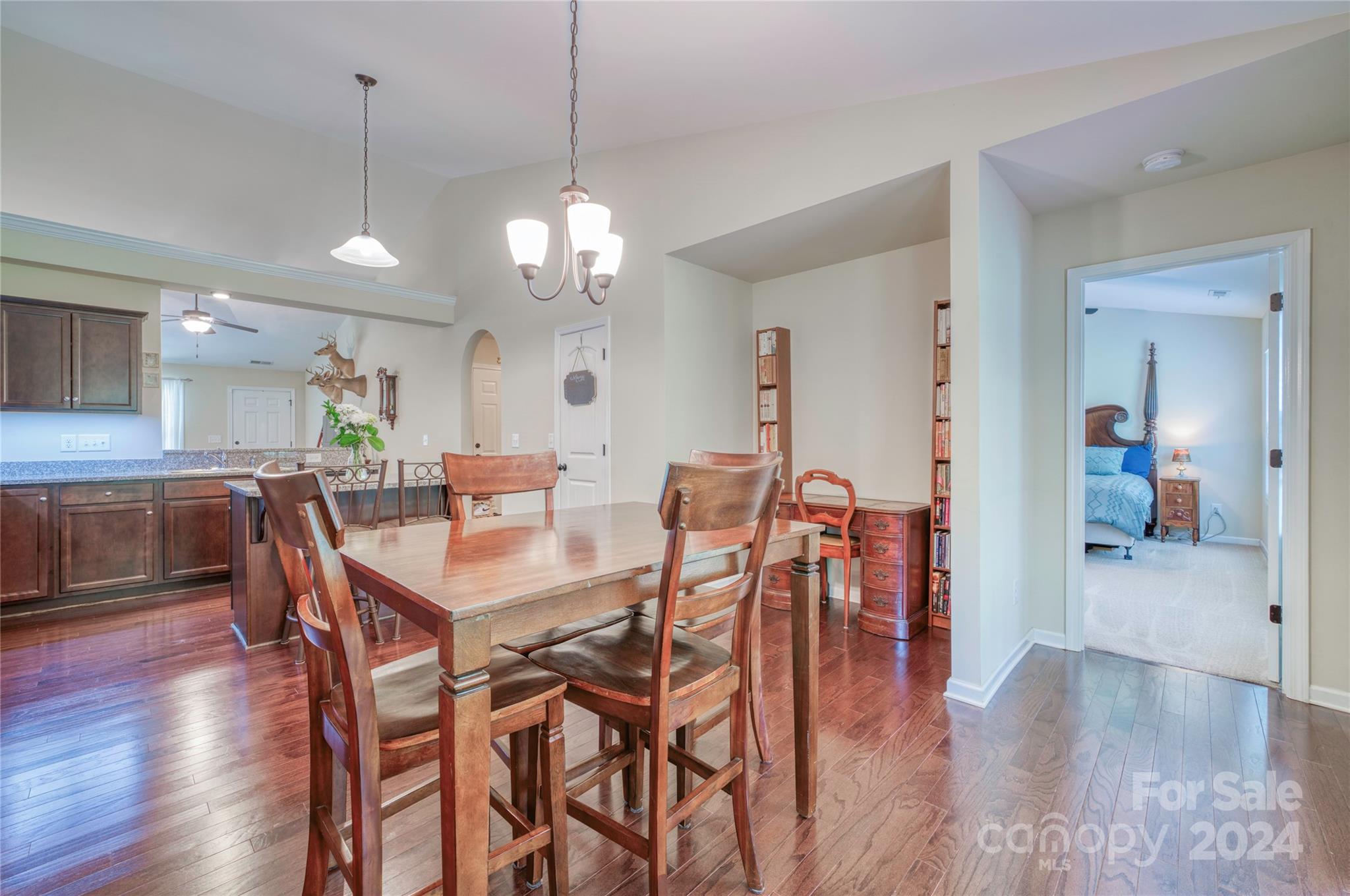 303 Reservation Road Catawba, SC 29704 - Photo 17 of 32 a view of a dining area with furniture and wooden floor