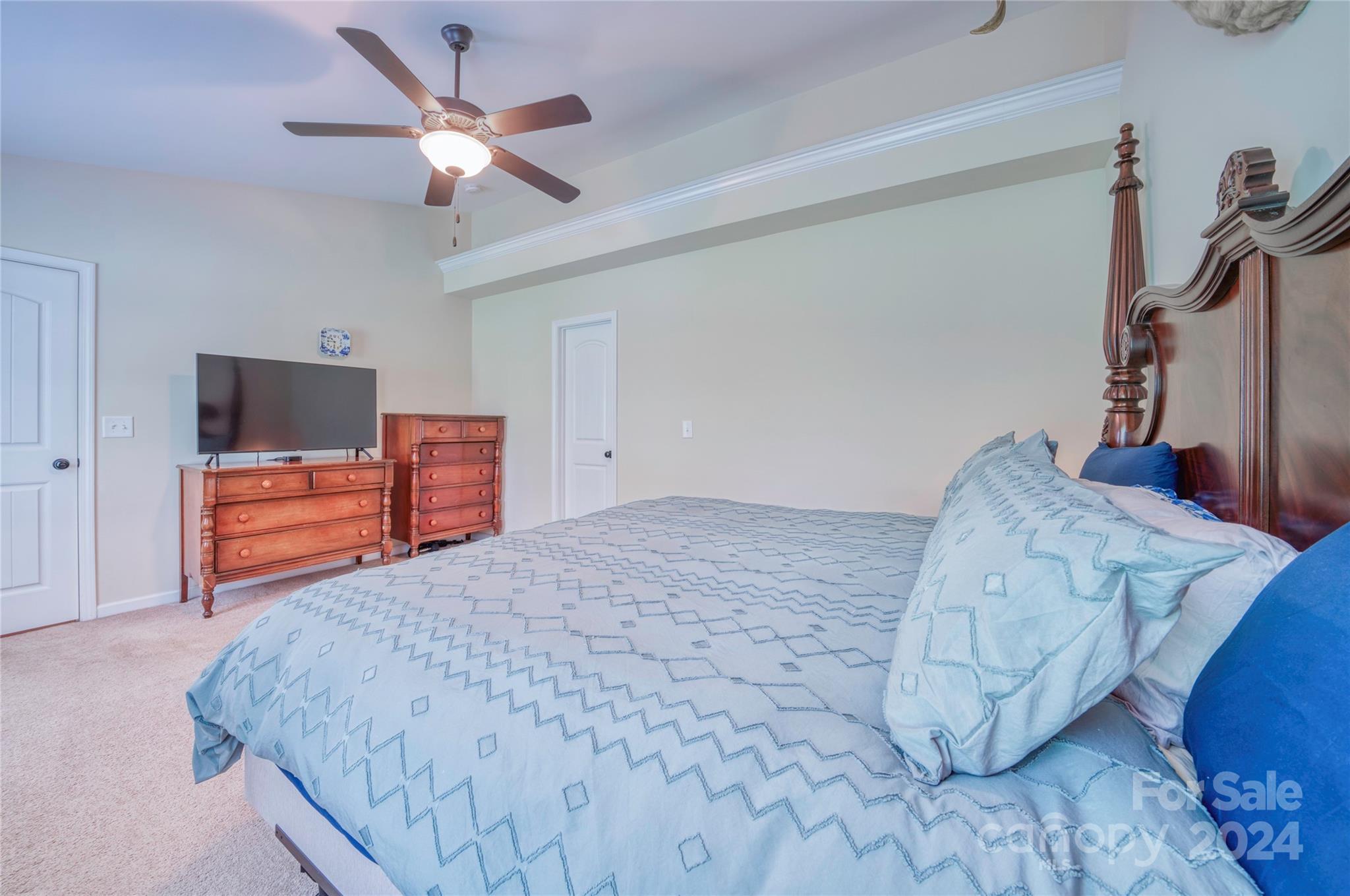 303 Reservation Road Catawba, SC 29704 - Photo 23 of 32 a bed room with a bed and a television
