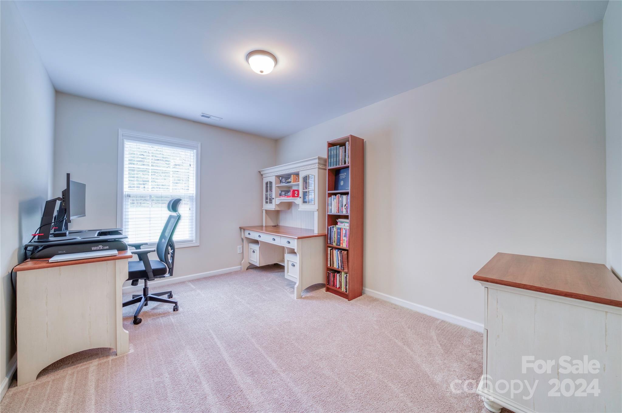 303 Reservation Road Catawba, SC 29704 - Photo 28 of 32 a view of a workspace with furniture and a window