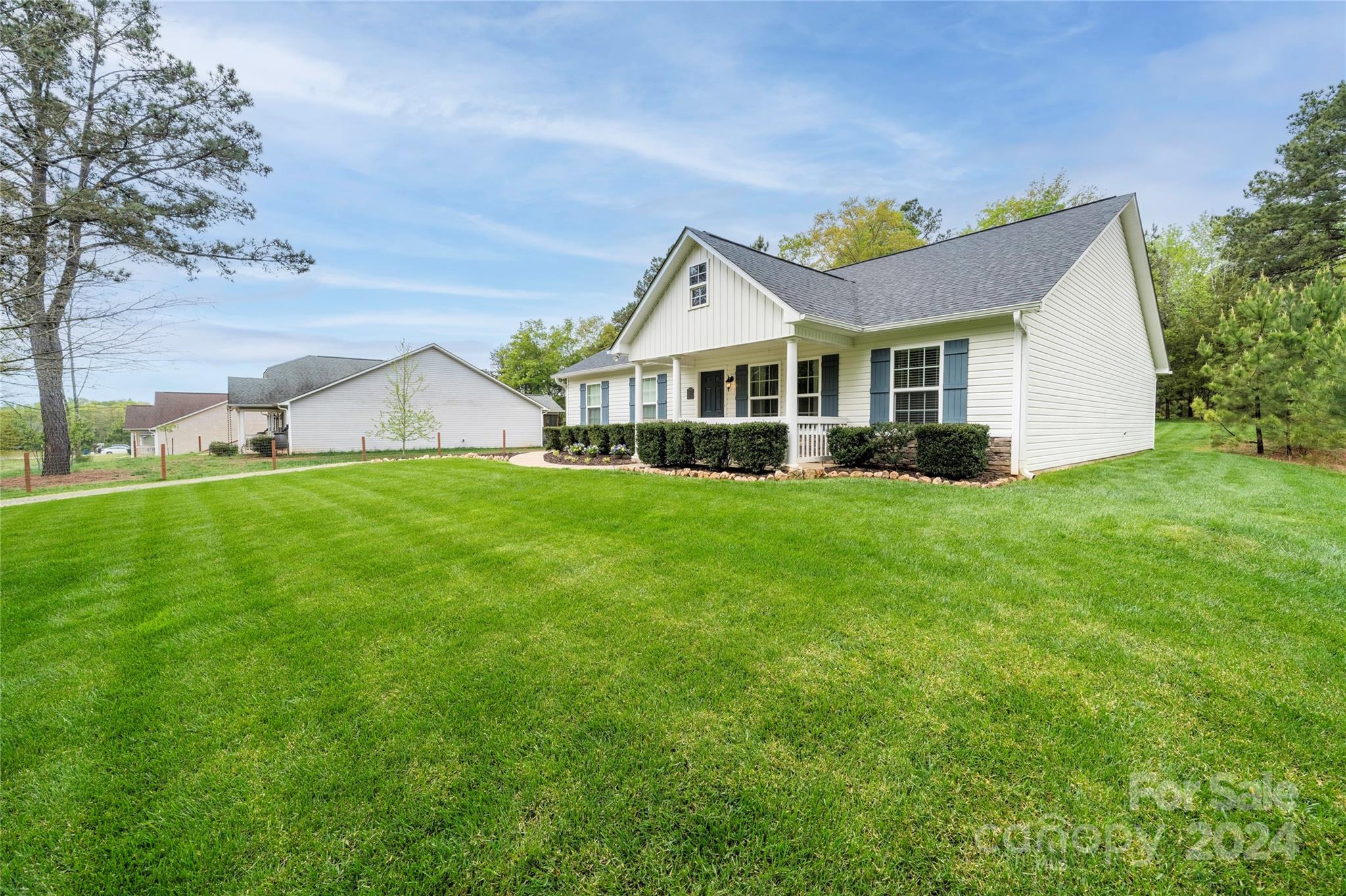 303 Reservation Road Catawba, SC 29704 - Photo 3 of 32 a front view of house with yard and green space