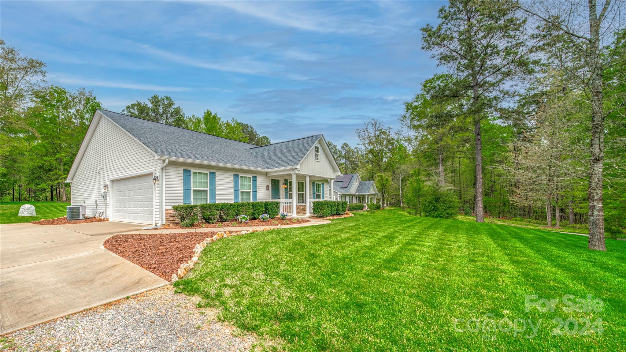 303 Reservation Road Catawba, SC 29704 - Photo 4 of 32 a front view of a house with a yard