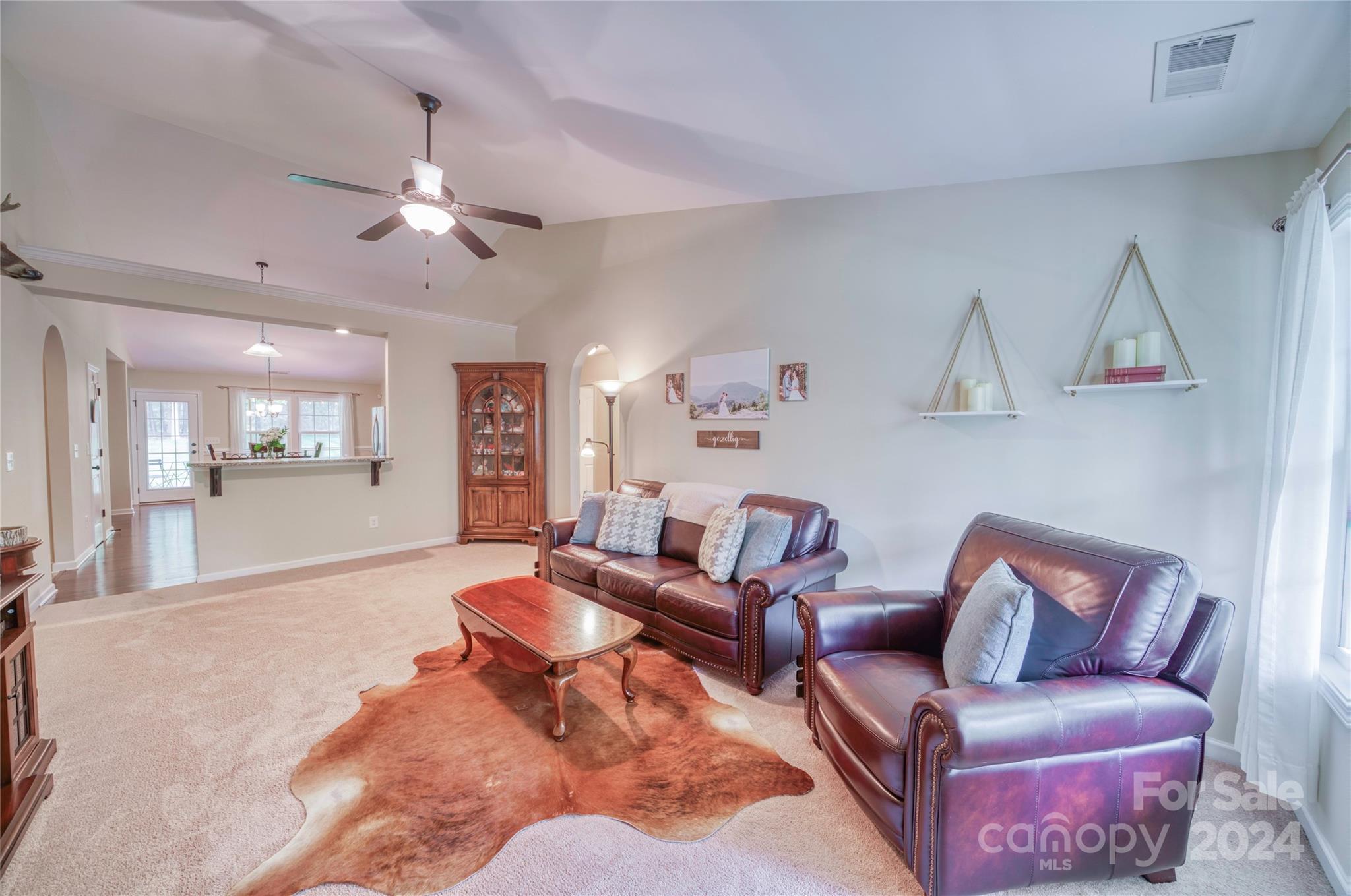 303 Reservation Road Catawba, SC 29704 - Photo 7 of 32 a living room with furniture and a wooden floor