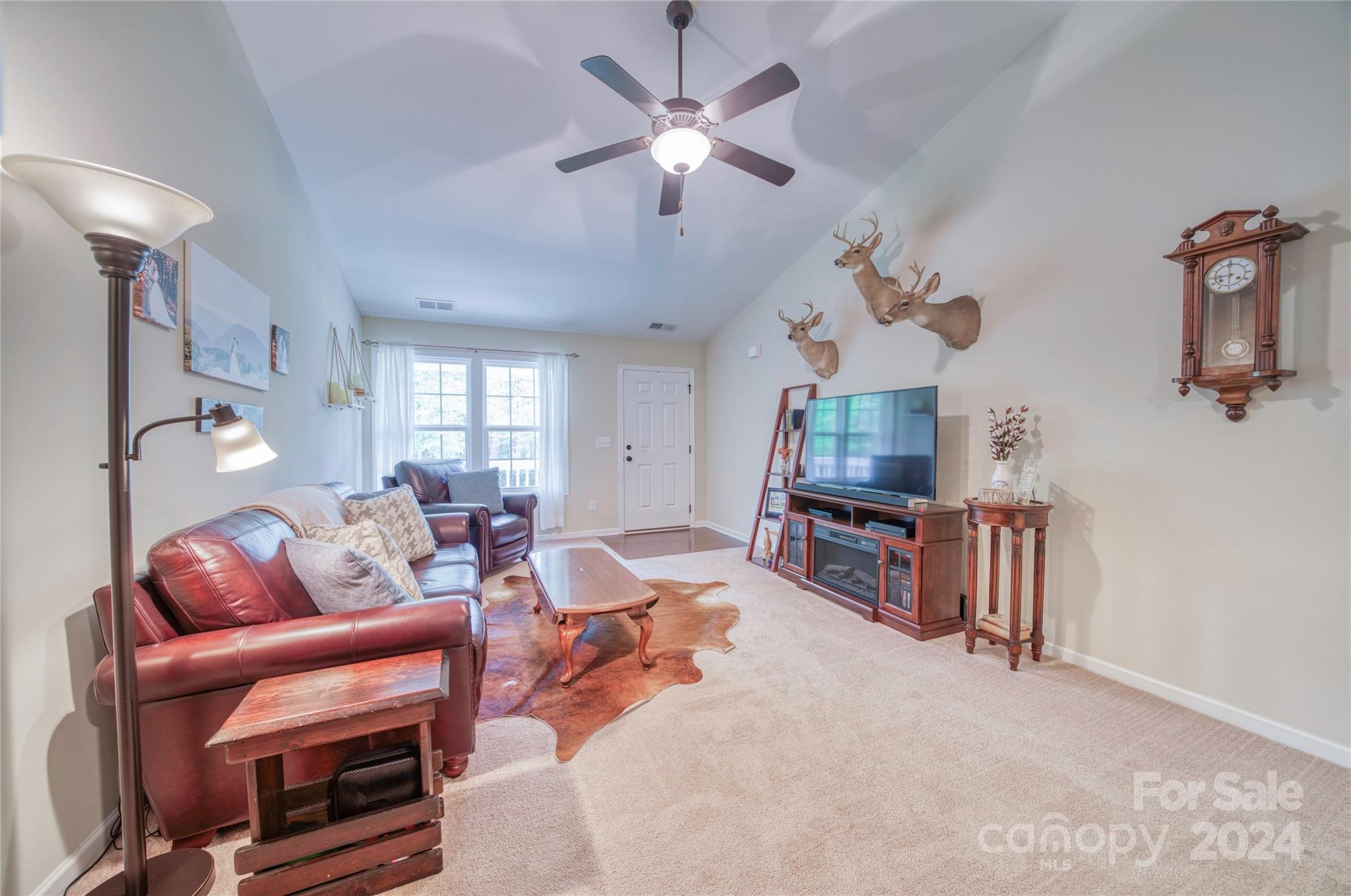 303 Reservation Road Catawba, SC 29704 - Photo 9 of 32 a living room with furniture and a flat screen tv