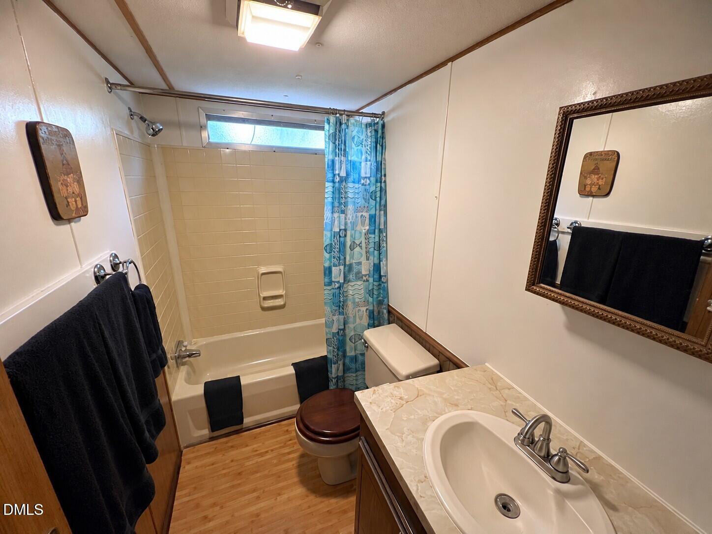 471 Kramer Road Lillington, NC 27546 - Photo 11 of 26 White paneled walls with wood trim details