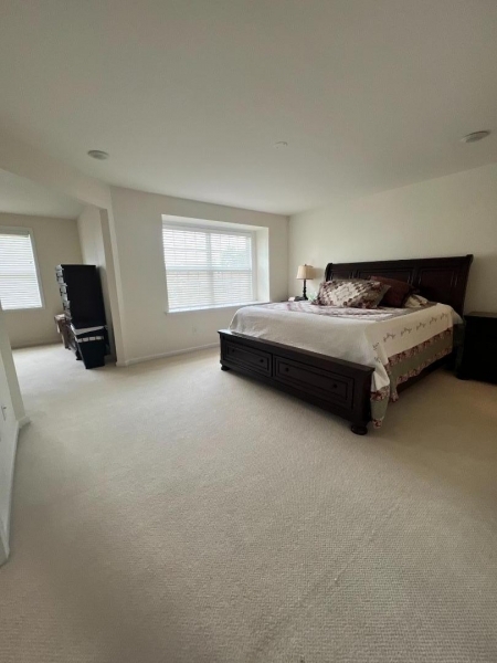 4 Greenwich Court Budd Lake, NJ 07828 - Photo 21 of 32 a bed room with furniture and a window