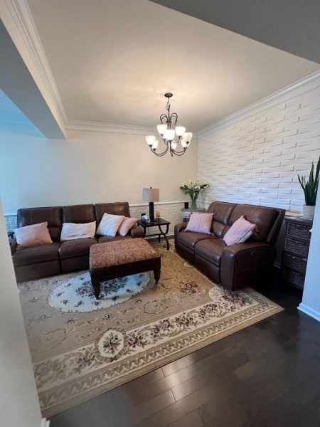 4 Greenwich Court Budd Lake, NJ 07828 - Photo 8 of 32 a living room with furniture and a chandelier