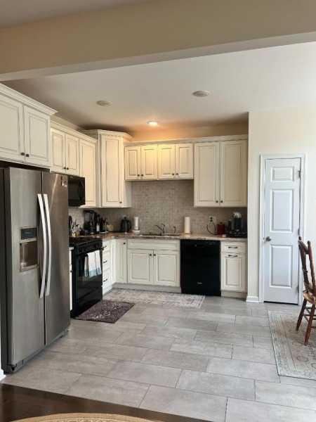 4 Greenwich Court Budd Lake, NJ 07828 - Photo 9 of 32 a kitchen with granite countertop a refrigerator and a stove top oven