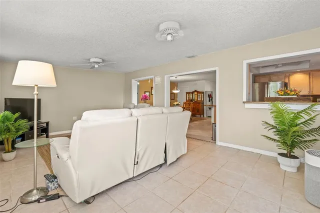 a view of a chairs and table in patio
