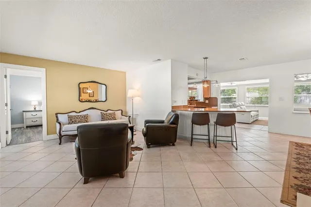 a living room with furniture and window