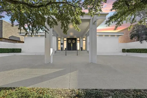 an entrance to house with yard