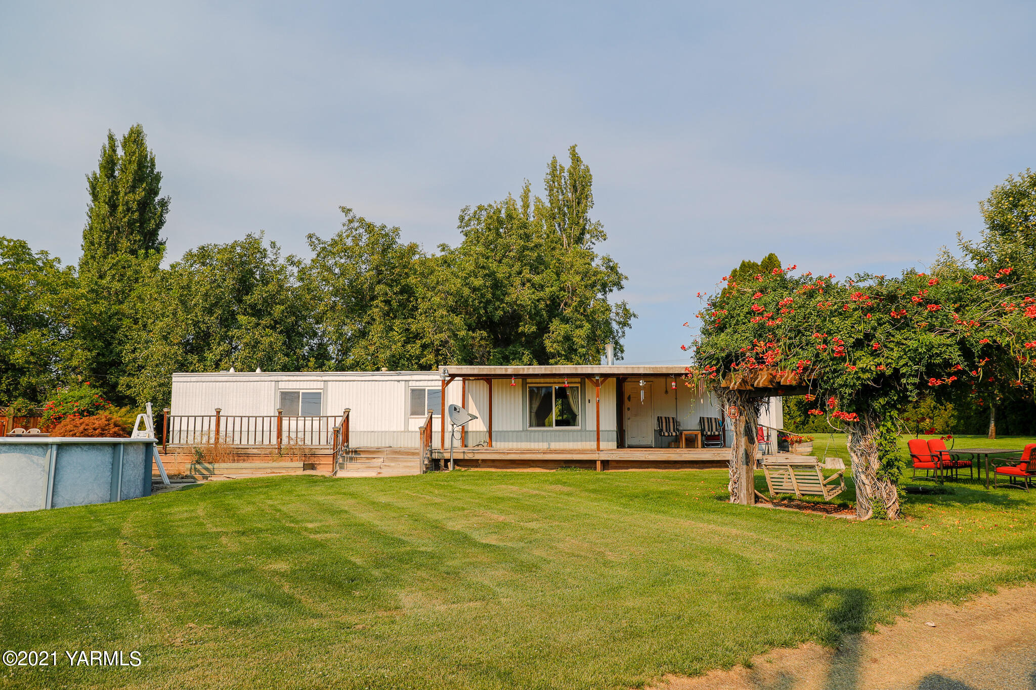340 Beane Road Moxee, WA 98936 - Photo 1 of 30 a view of a house with a backyard