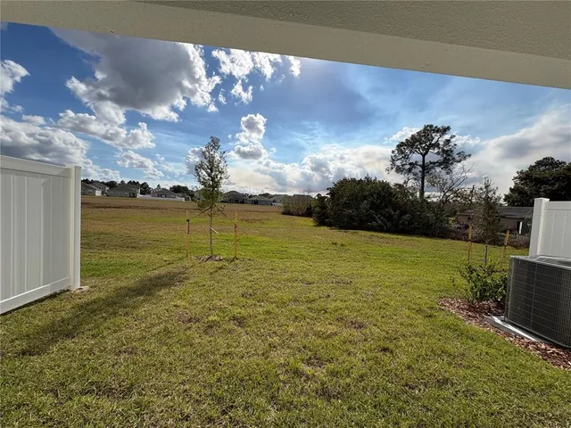 a view of a golf course with a lake