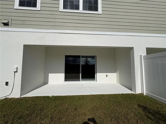 a front view of a house with an empty space