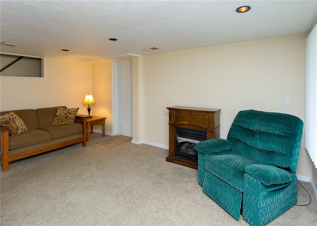 108 Navy Street Perryopolis, PA 15473 - Photo 9 of 19 Family room with decorative fireplace