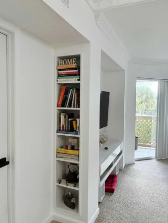 a room with furniture and window
